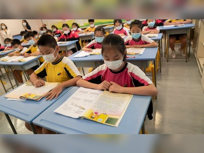 Hong Kong to ease limits on classroom numbers