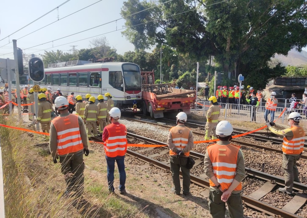 Around 22 people were injured after a truck and a light rail train collided near Chung Uk Tsuen station in the New Territories at around1.13pm today.