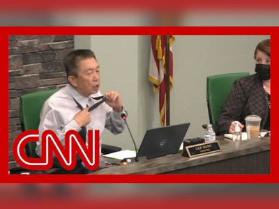 Asian-American Veteran reveals scars during meeting, asks 'Is this patriot enough?'