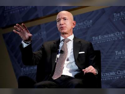 Bezos, Musk top Forbes' record-setting billionaire list