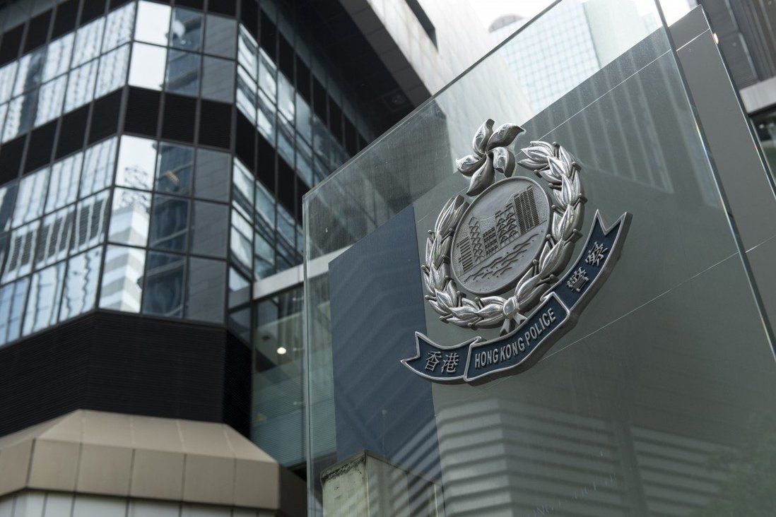 Hong Kong police officer among 65 arrested in raid on illegal gambling den