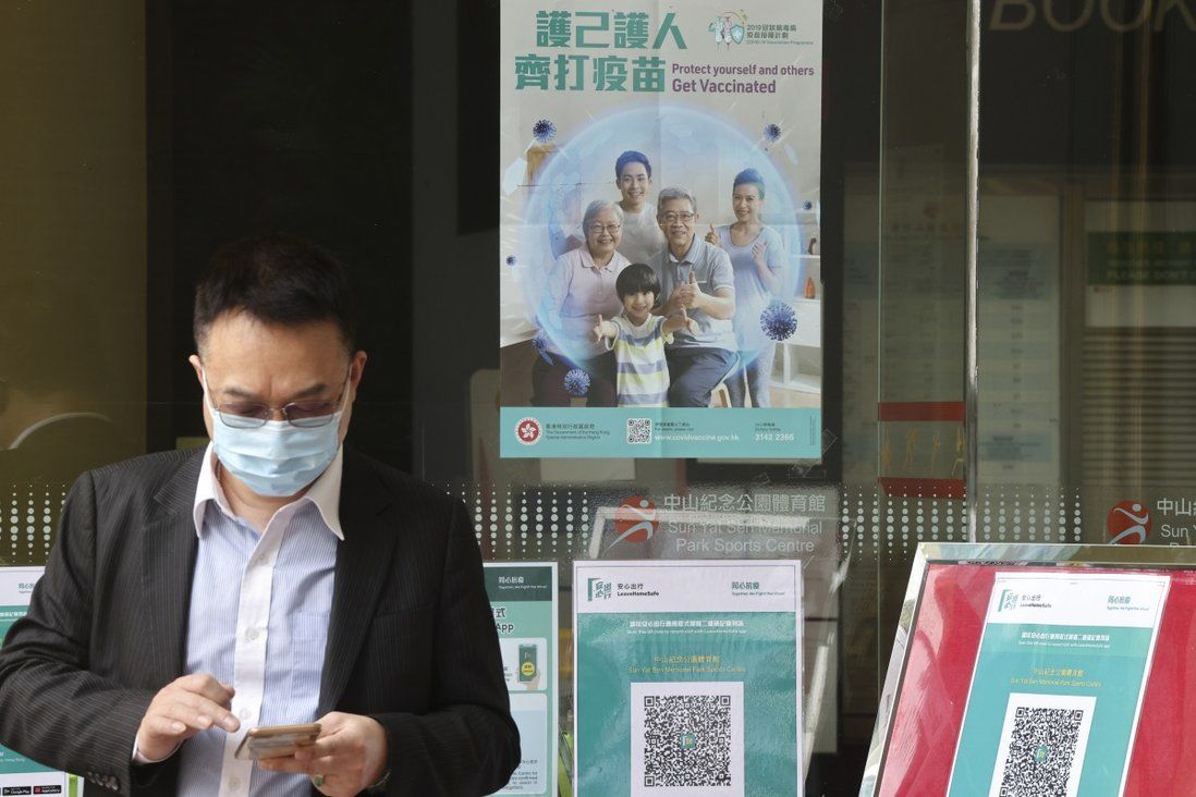 ‘Vaccine hesitancy’ may delay easing of restrictions in Hong Kong, experts warn