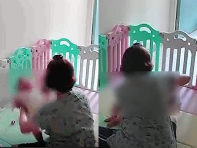 Helper arrested after throwing crying infant onto cushion