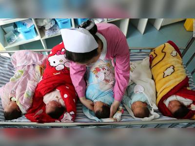 China to allow parents to have up to three children