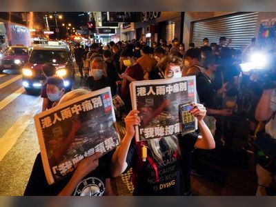Lights out: Hongkongers queue for hours to buy Apple Daily’s final issue