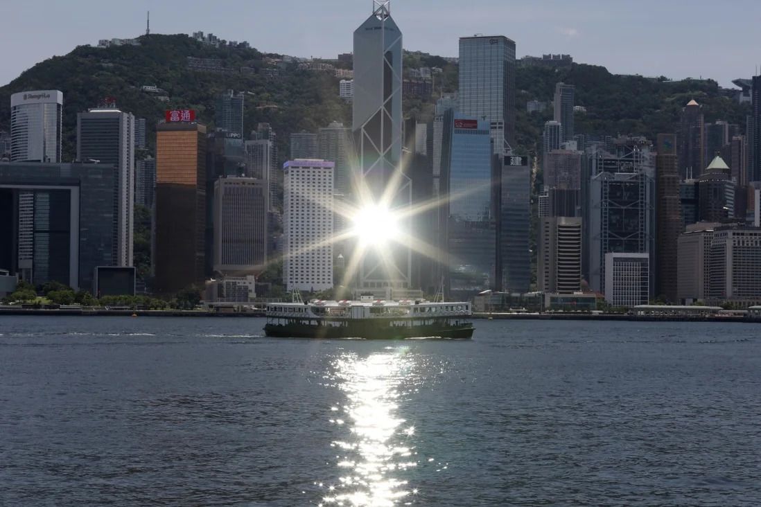 IMF says Hong Kong's financial system resilient to future shocks, cautions property valuations and deep China links as potential risks
