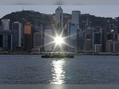 IMF says Hong Kong's financial system resilient to future shocks, cautions property valuations and deep China links as potential risks