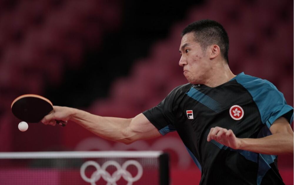 Lam Siu-hang brings home joy as he wins in round 32 of table tennis