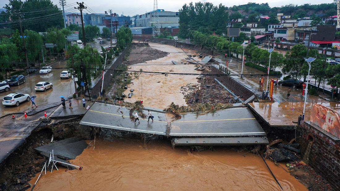 Record-breaking rains devastated central China, but there is little talk of climate change