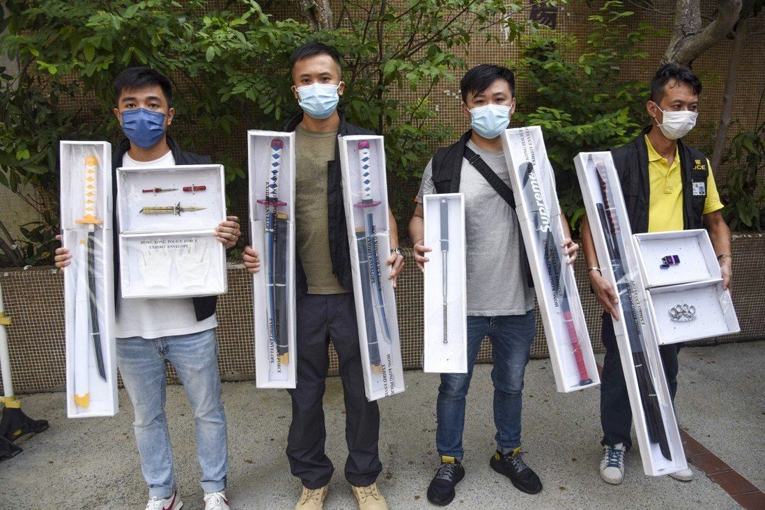 Hong Kong police arrest student, seize weapons in raid on Kwun Tong flat
