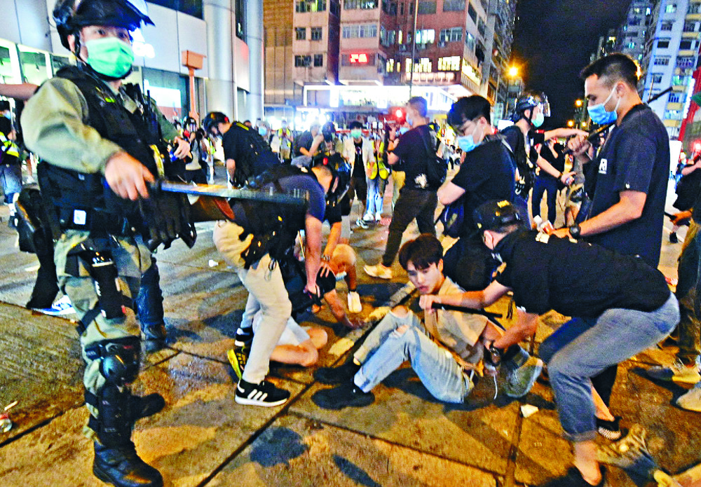 June 4 vigil protester held over rioting in Mong Kok