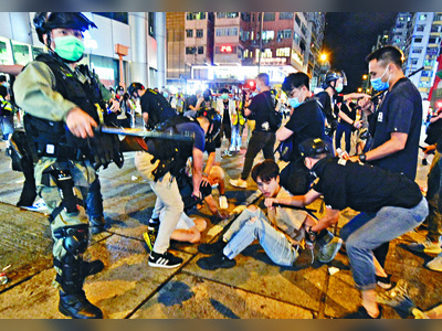 June 4 vigil protester held over rioting in Mong Kok