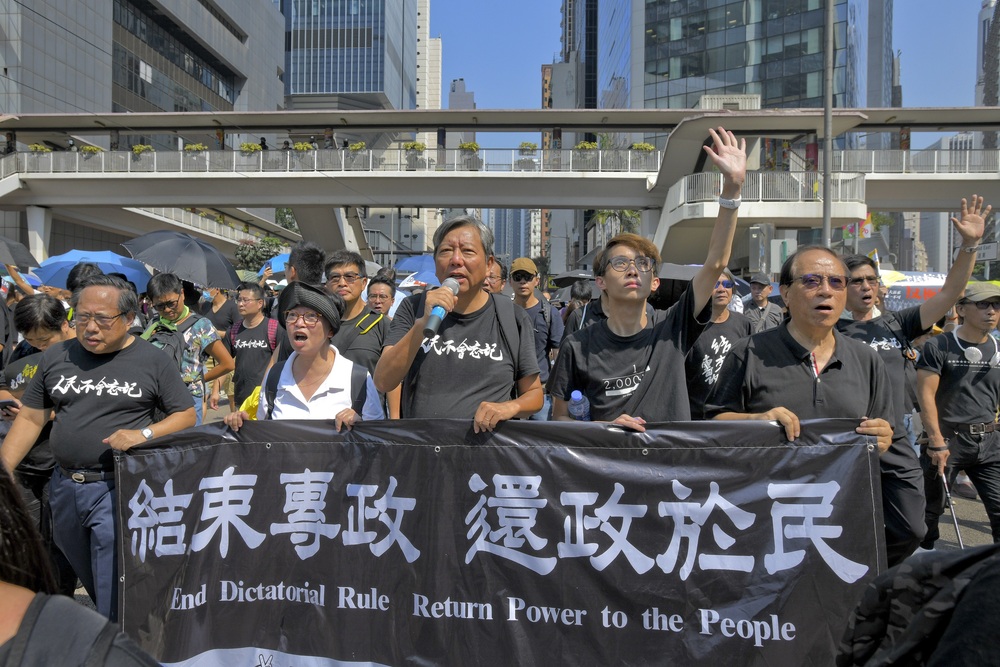 Seven activists plead guilty to unlawful assembly charges