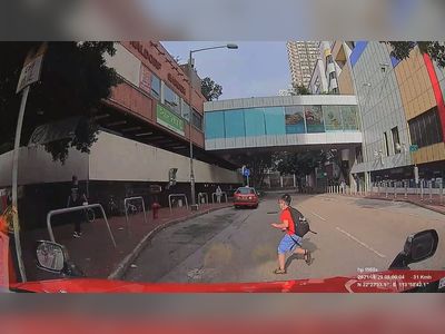 Child narrowly escapes crash in Tuen Mun