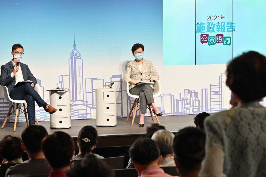Hong Kong leader defends work to ease housing woes during town hall grilling