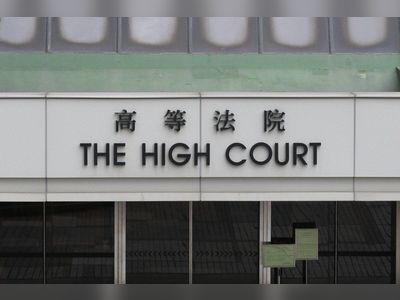 Hong Kong barrister and ex-solicitors’ clerk held for perverting justice