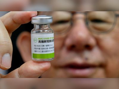 Taiwan begins using a homegrown vaccine after months of shortages in imports