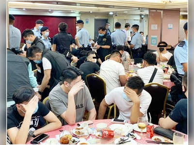 Five arrested and 123 persons fined at triad dinner party