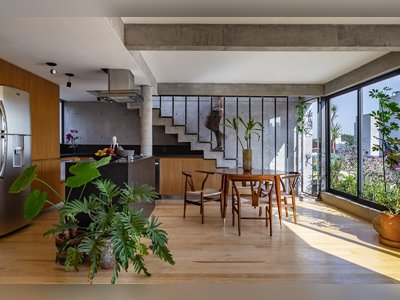 A Mexico City Apartment Building Offers Lush Terraces Clad in Concrete and Steel