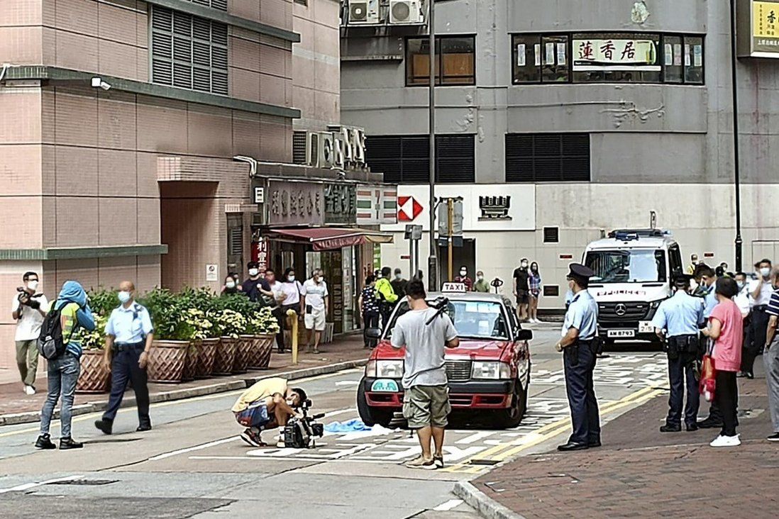 Taxi driver arrested after knocking down elderly woman and dragging her