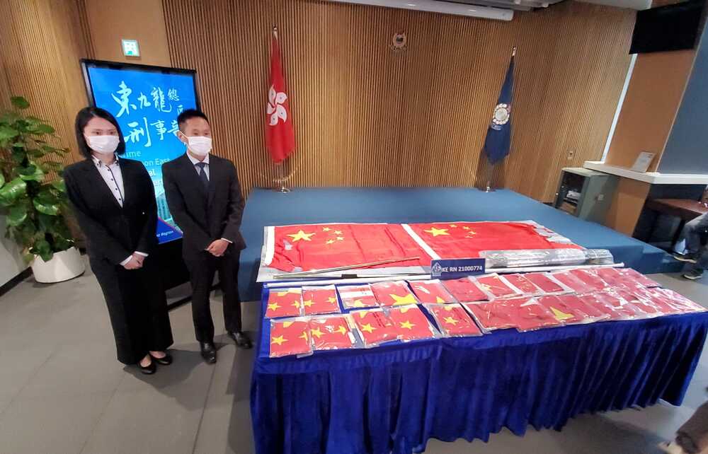 Man arrested for burning China's flags on National Day