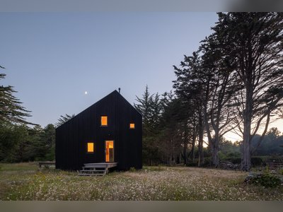An Angular Black Cabin in Coastal France Honors the Bucolic Landscape