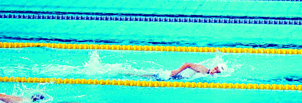 Swim queen gets third games gold