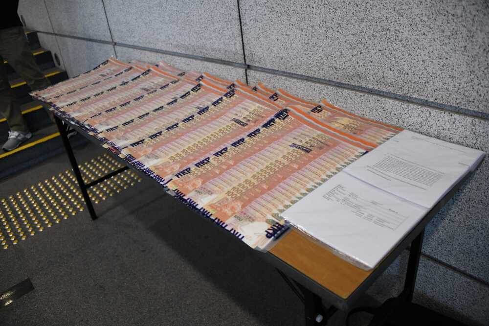 Two men arrested for borrowing HK$6m mortgage using a stolen document