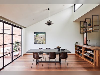 The Tile Covering This Melbourne Home Is So Shiny It Reflects the Yard