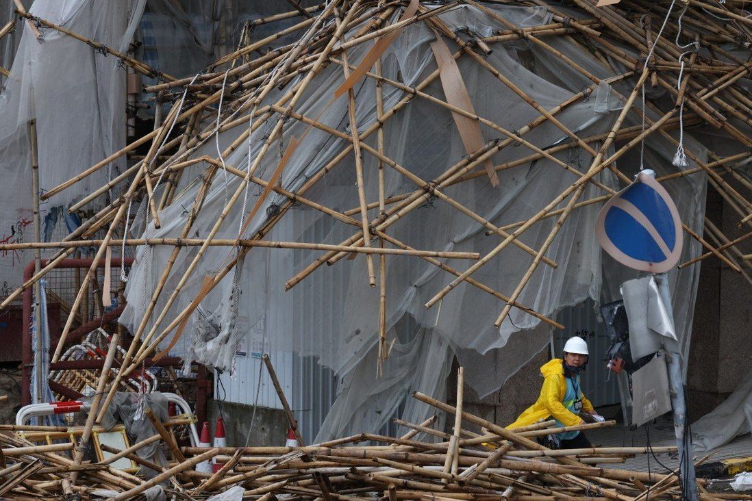 Tropical storm halts clean-up works at site of deadly scaffolding collapse