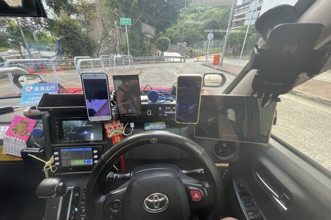 Why a Hong Kong taxi driver needs 5 dashboard smartphones