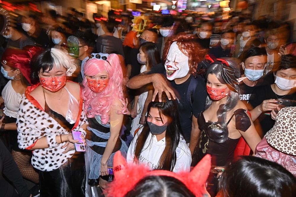 Squid Game and "Covid" cosplayers join Halloween parties