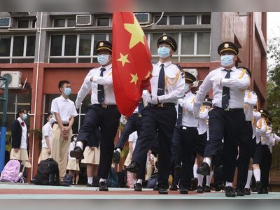 Hong Kong universities must also hold weekly flag-raising ceremonies