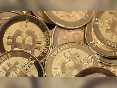 Bitcoin price continues slide below $60,000