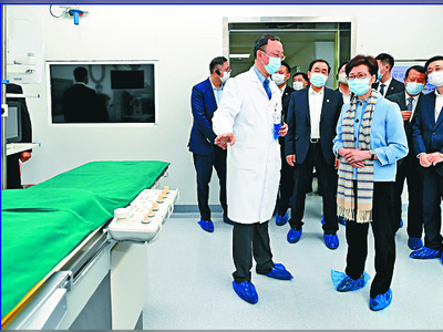 Invest in health care, says Lam on Wuhan visit