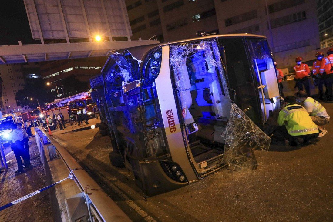 At least one dead as double-decker bus overturns in Hong Kong