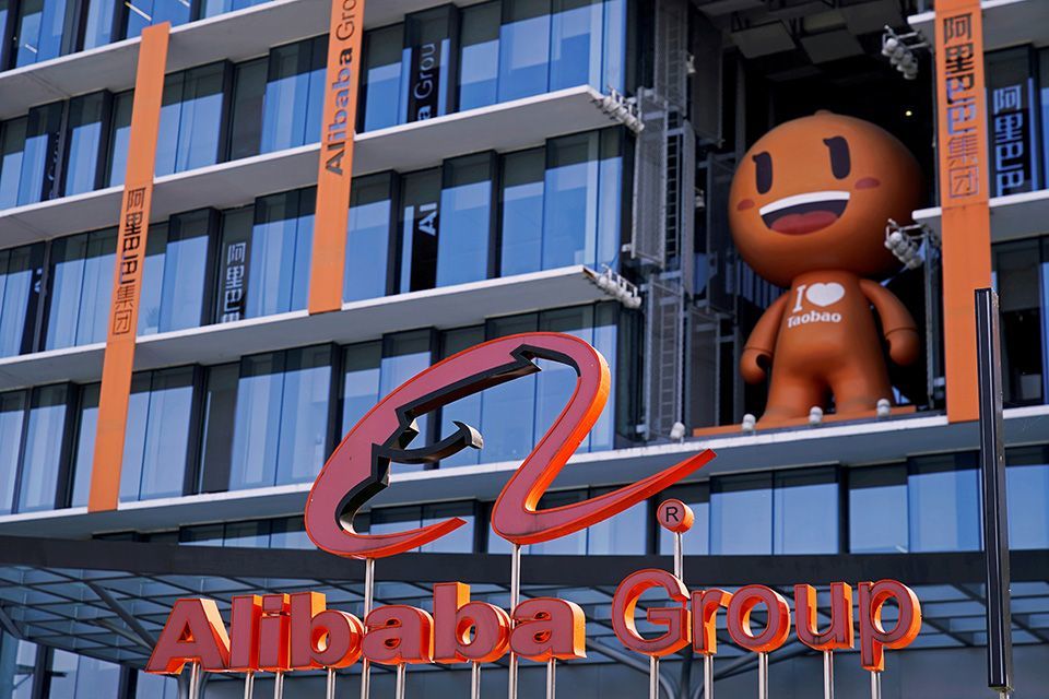Hong Kong shares down on Alibaba, losses limited by property