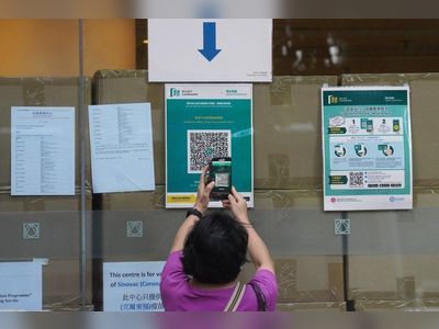 Hong Kong ‘will be lenient at first’ as new app mandate takes effect