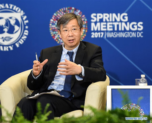 China’s central bank governor pledges support for Hong Kong as financial hub