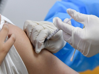 Man jabbed twice in the arm at Sinovac vaccination center