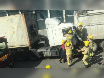 Truck driver trapped in four-car crash in Yuen Long