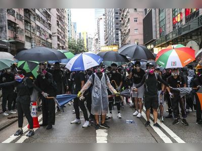 3 jailed for 2½ months each for flouting Hong Kong anti-mask law