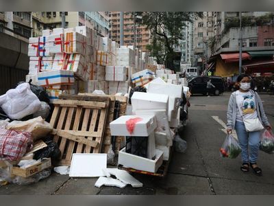 Why walls of empty styrofoam boxes are piling up across Hong Kong neighbourhoods