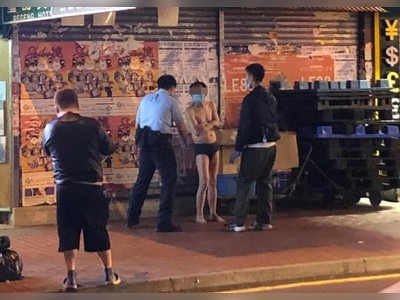‘Briefs’ meeting in Mong Kok as police hand out mask to man in underwear