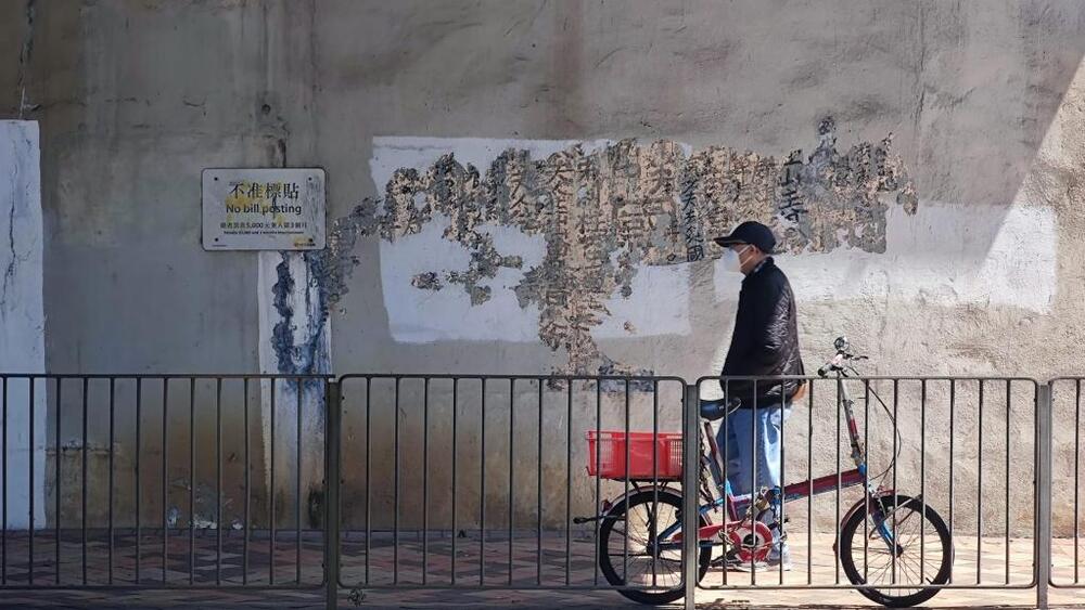 Graffiti by 'King of Kowloon' resurfaces after paint peels off in Mong Kok