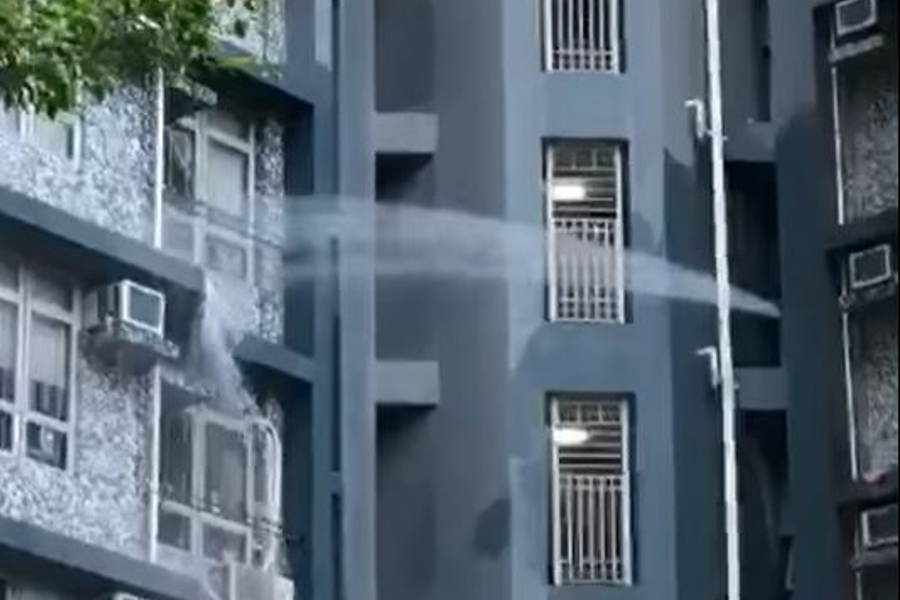 Pipe burst sees jet of water shooting neighbor's flat at Kwai Chung Estate