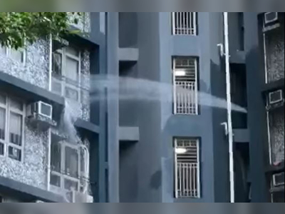 Pipe burst sees jet of water shooting neighbor's flat at Kwai Chung Estate
