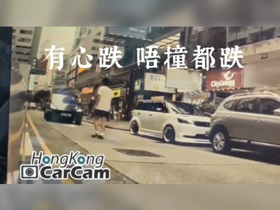 Man fakes being hit by car in Mong Kok