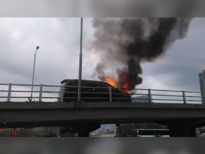 Driver and passengers unscathed after car bursts into flames