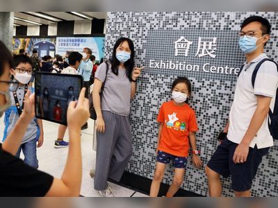 Eager Hong Kong rail fans get first look at new Exhibition Centre station